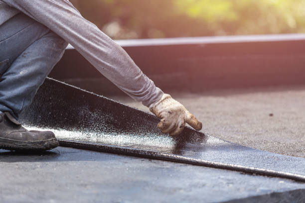 Professional Waterproofing technician working in Fredonia, KS